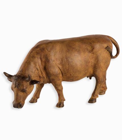 Statue vache qui broute